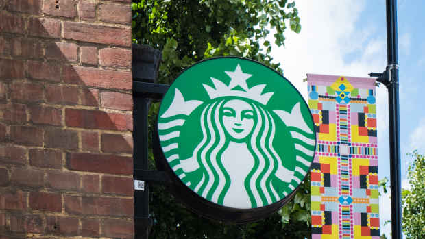 London, UK - July 22, 2024: Starbucks cafe in London. Starbucks Corporation is world's largest coffeehouse chain, trading in Nasdaq stock exchange.