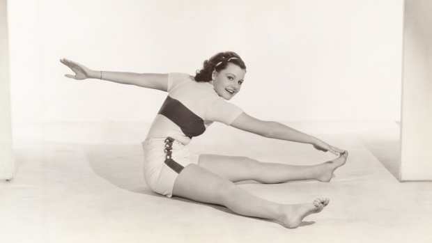 A woman from the 1940s is exercising.
