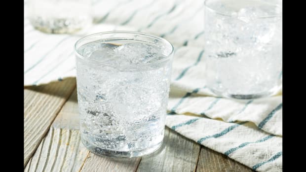 A glass of sparking seltzer water.